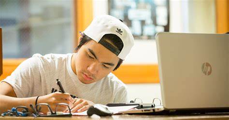 student writing a technical essay