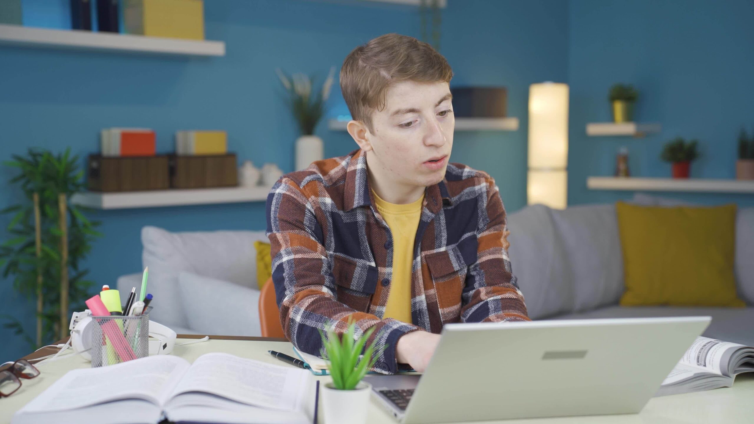 unhappy-student-looking-at-laptop-to-do-essay-with-chatgpt