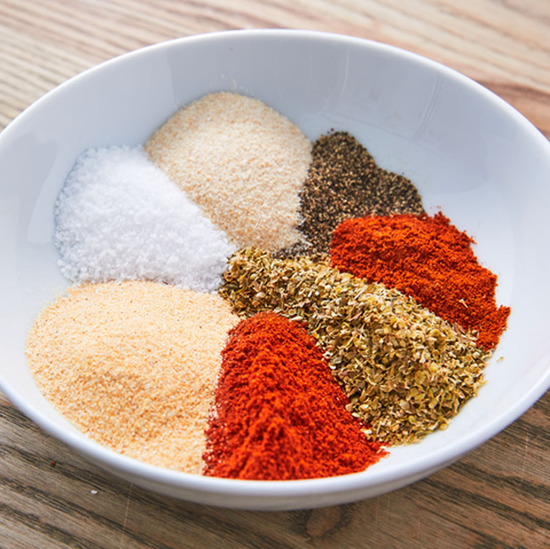 seasoning steak with salt